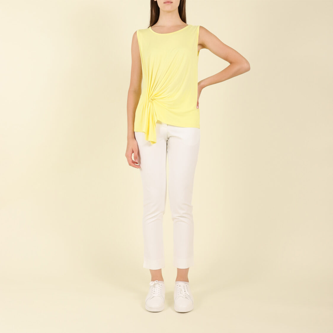 yellow sleeveless top